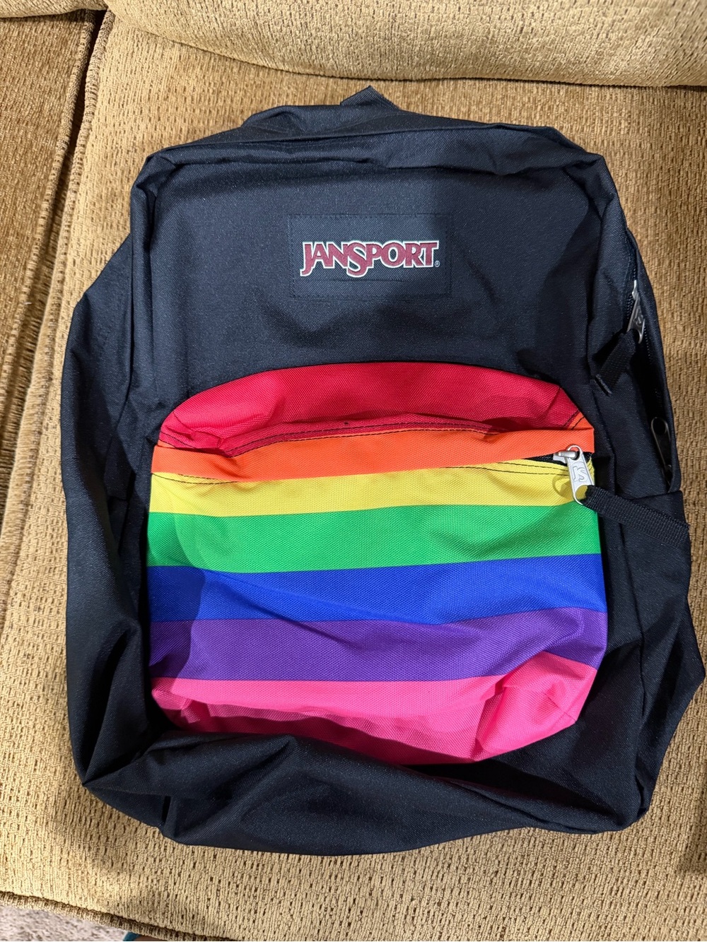 Jansport Black Backpack with Rainbow Stripe Front Pocket
